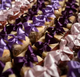 Bem-Casados - Symbolizing a sweet and blissful union, our traditional bem-casados feature two delicate, soft sponge cakes embracing a luscious doce de leite filling.