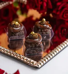 Brownies - Indulge in our classic, fudgy brownies, baked to perfection with a signature crackly top and an intensely rich, melt-in-your-mouth chocolate center.